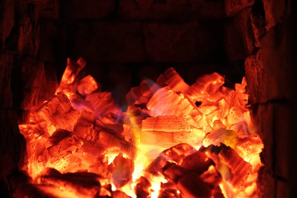 Firewood beautifully lit background — Stock Photo, Image
