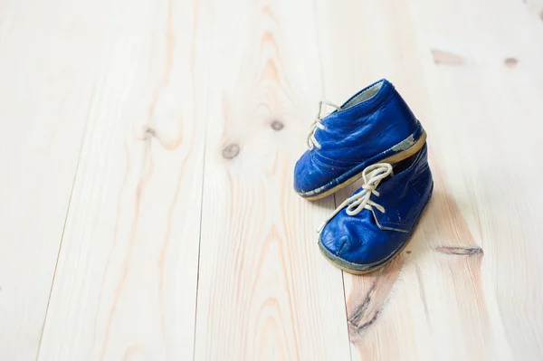 Ahşap, retro arka plan üstünde Vintage çizme.