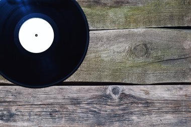 eski vinil kaydını eski vintage zemin üzerinde beyaz etiketle