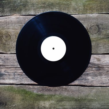 eski vinil kaydını eski vintage zemin üzerinde beyaz etiketle