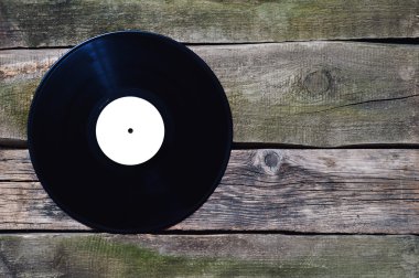 eski vinil kaydını eski vintage zemin üzerinde beyaz etiketle