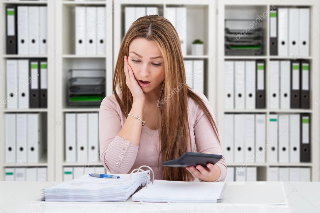 Businesswoman Calculating Finance 