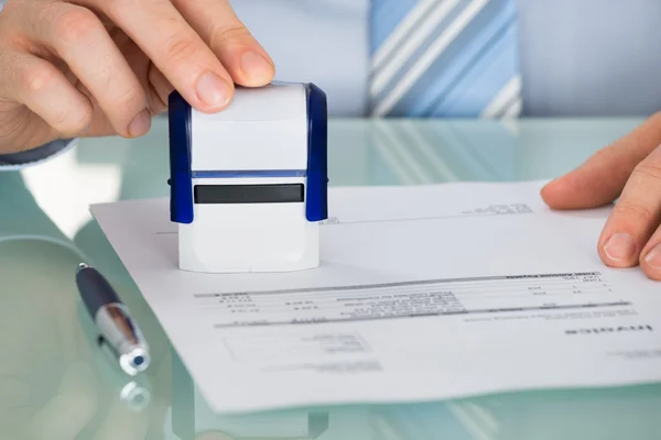 Pressing Stamper On Document — Stock Photo, Image