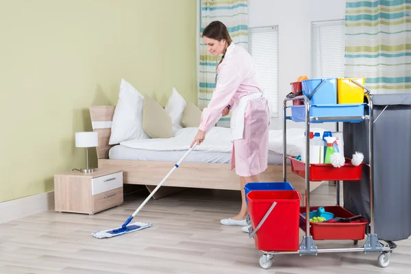 Female Housekeeper Mopping Floor — Stock Photo, Image