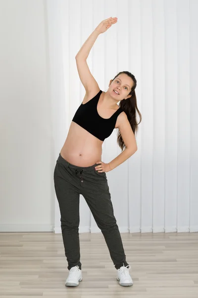 Mulher fazendo exercício — Fotografia de Stock