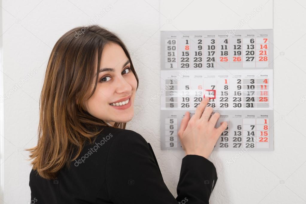 Businesswoman with Calendar Date