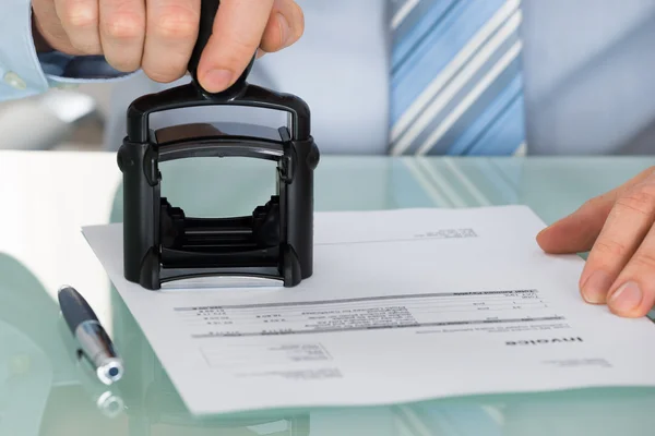 Person's Hand Stamping Document — Stock Photo, Image
