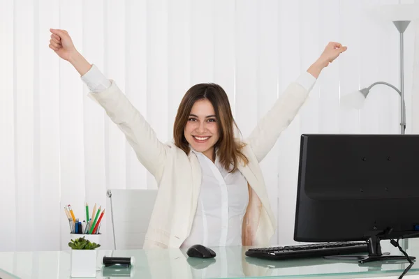 Businesswoman Raising Arms Stock Picture