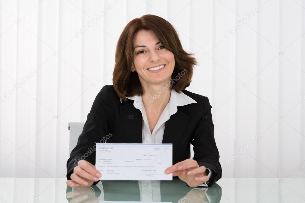 Businesswoman Offering Cheque