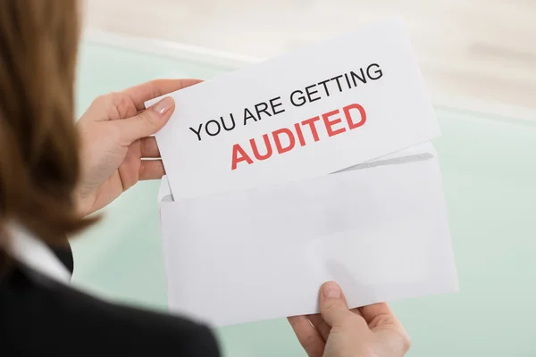 Businesswoman Opening Audit Letter — Stock Photo, Image