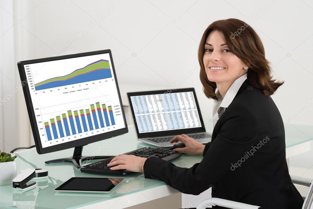 Businesswoman Working With Graphs