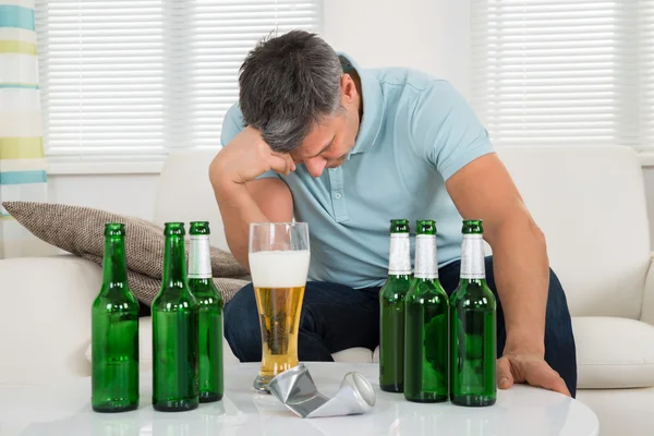 Man Sitting On Sofa — Stock Photo, Image