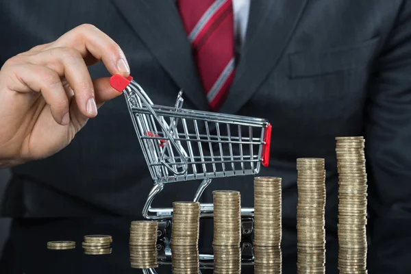 Coins And Shopping Cart — Stock Photo, Image