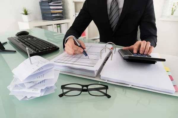 Businessman Calculating Tax — Stock Photo, Image