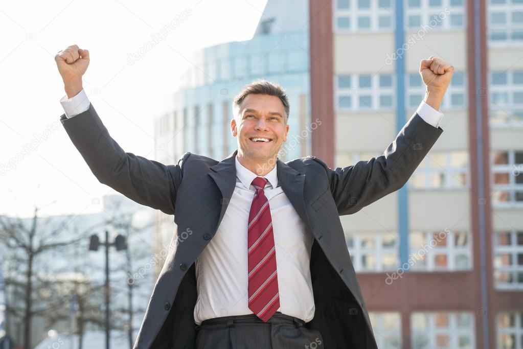 Businessman With Arms Raised