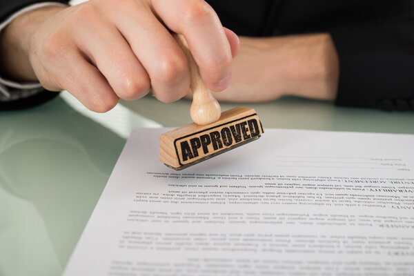 Businessman Hand Approving Document