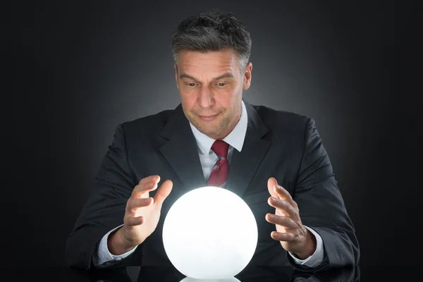 Businessman With Crystal Ball — Stock Photo, Image