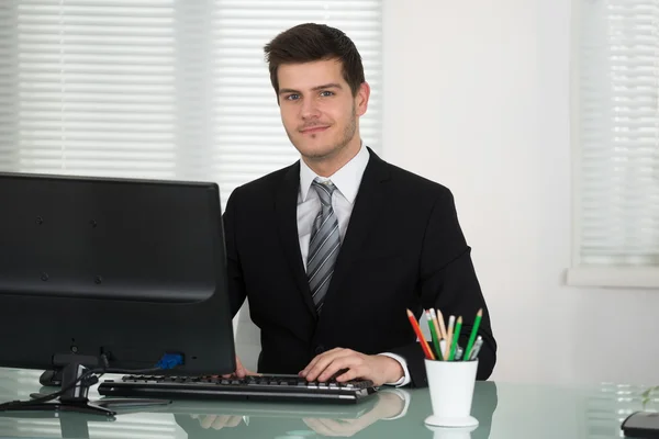 Young Businessman Working In Office — Stock Photo, Image