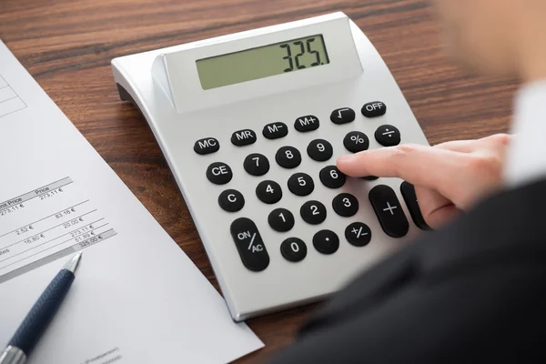 Businessman Calculating Bill — Stock Photo, Image