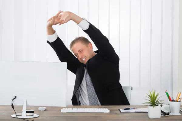 Young Businessman Stretching — Stock Photo, Image