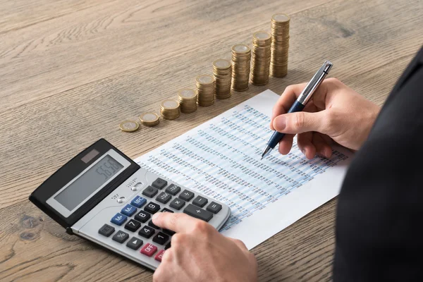 Close-up Of A Businessman Analyzing Financial Report — Stock Photo, Image