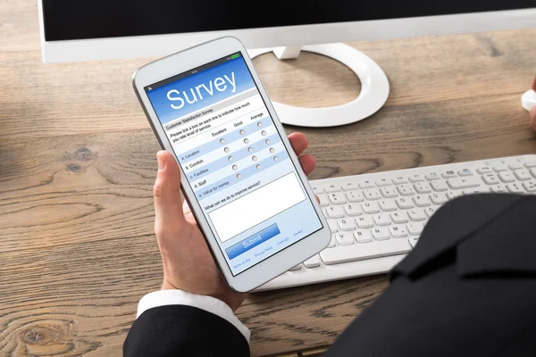 Businessman Filling Online Survey Form — Stock Photo, Image