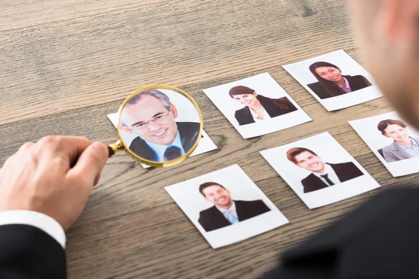 Businessman Viewing Candidates — Stock Photo, Image