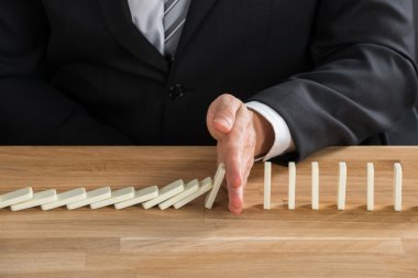 İşadamı durdurma Domino düşmesini