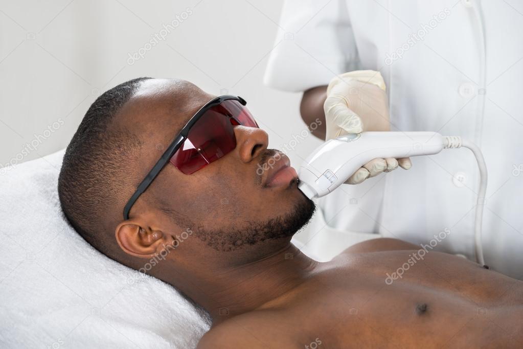 Laser Epilation Treatment On Young Man ⬇ Stock Photo, Image by