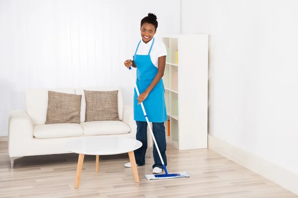 Female Janitor Mopping Floor — Stock Photo, Image