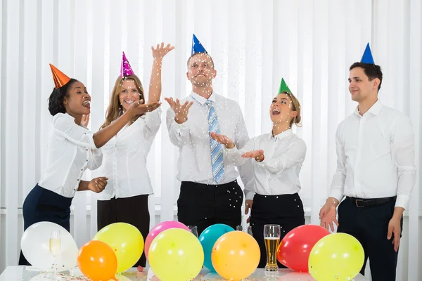 Businesspeople Standing Under Falling Confetti — Stock Photo, Image