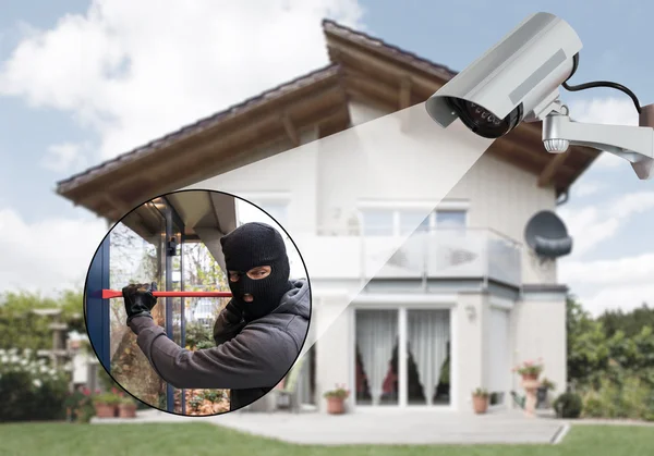 Surveillance Camera Capturing A Burglar — Stock Photo, Image