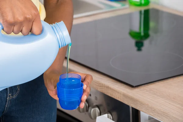 Female Hands Pouring Detergent In Cap — Stock Photo, Image