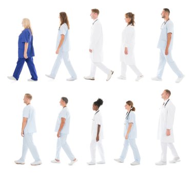 Medical Team Walking In Row clipart