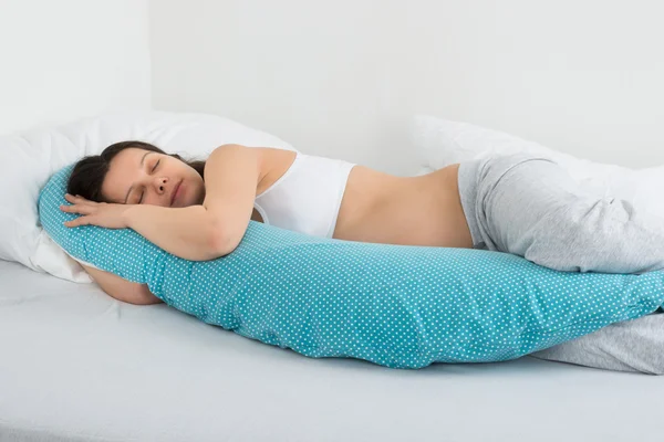 Expecting Woman Sleeping On Bed — Stock Photo, Image