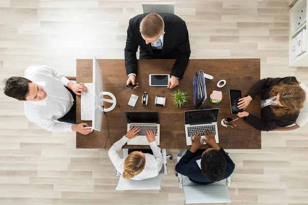 Businesspeople at project meeting — Stock Photo, Image