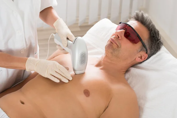 man Receiving Laser Hair Removal