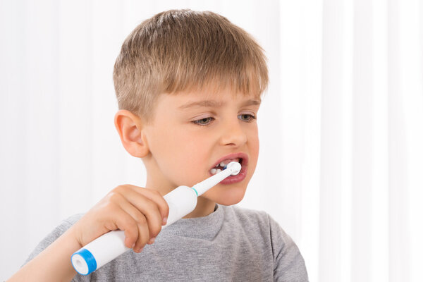 Boy Brushing Teeth