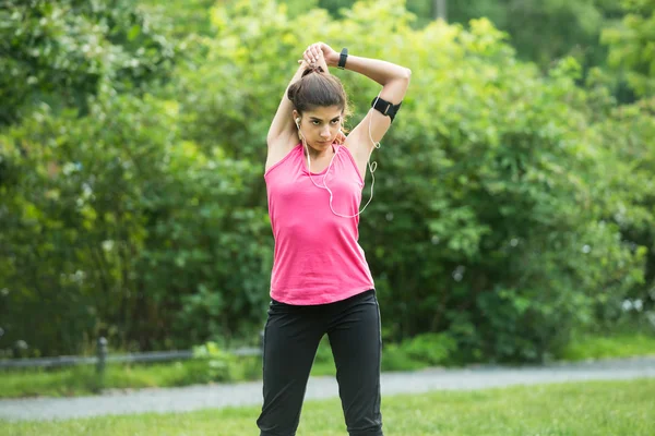 Young Woman Stretching Her Hands — Stock Photo, Image