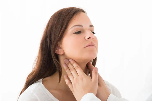 Doctor Checking Thyroid Of A Young Woman — Stock Photo, Image