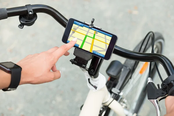 Finger Pointing At Smart Phone Showing GPS Navigation — Stock Photo, Image