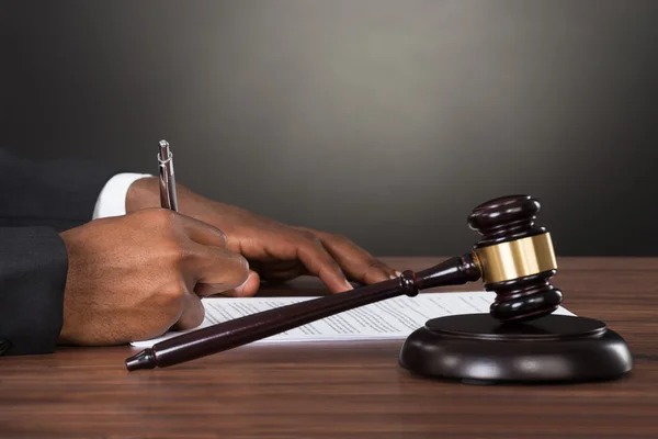 Close-up Of A Judge Writing On Paper — Stock Photo, Image