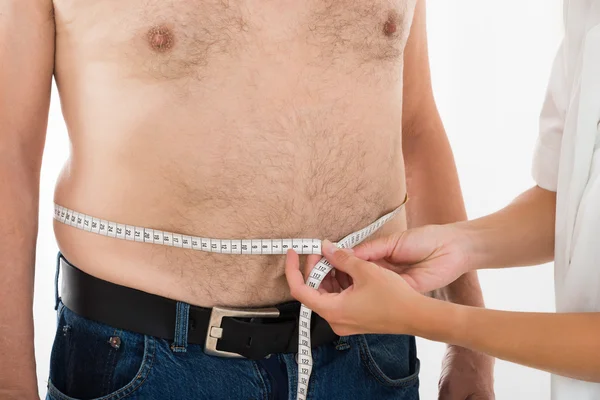 Doctor Measuring Person's Waist — Stock Photo, Image