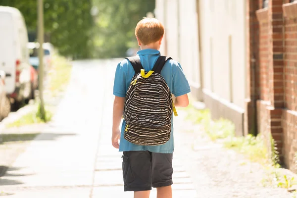 Schoolboy Walking On Sidewalk — Stock Photo, Image