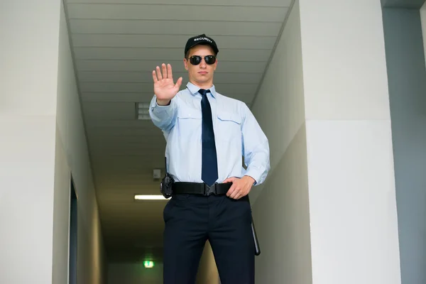 Security Guard Making Stop Gesture — Stock Photo, Image