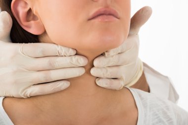 Woman Getting Thyroid Gland Control clipart