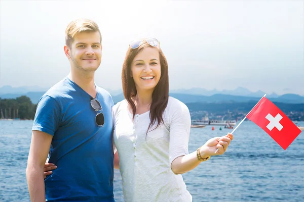 Couple Holding Swiss Flag — Stock Photo, Image