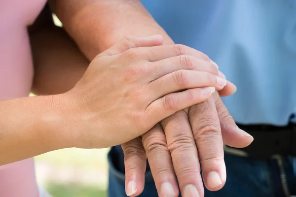 Woman Holding Man's Hand — Stock Photo, Image