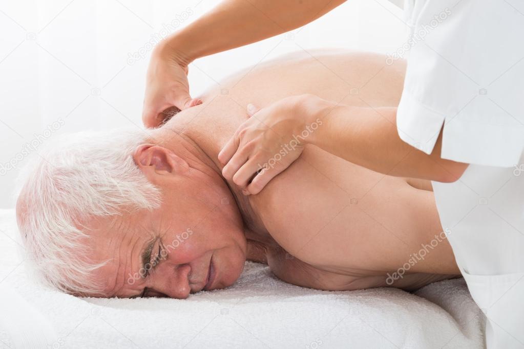 Man Receiving Back Massage