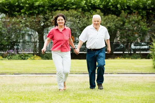 Couple Running In Park — Stock Photo, Image